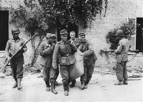 Us Soldiers Guard German Pow Leaving Hideout In Normandy 1944 World
