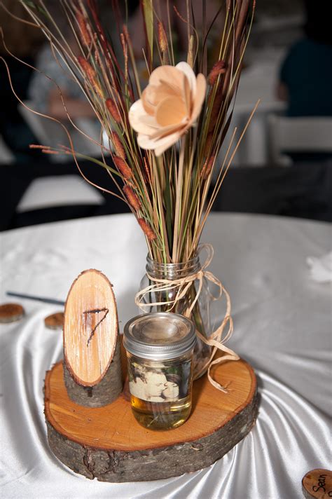 Wood Centerpieces And Table Numbers Diy Wood Themed Wedding Outdoor