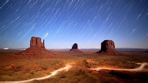 Time Lapse Of Night Sky And Lights In Monument Valley Navajo Tribal