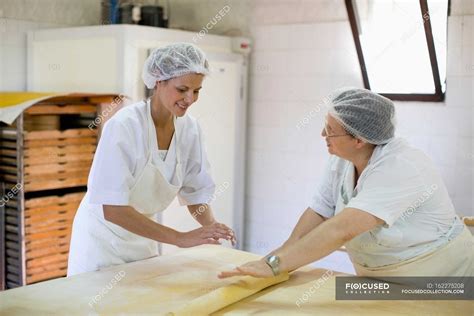 Chef Showing How To Use Rolling Pin — Caucasian Women Attractive