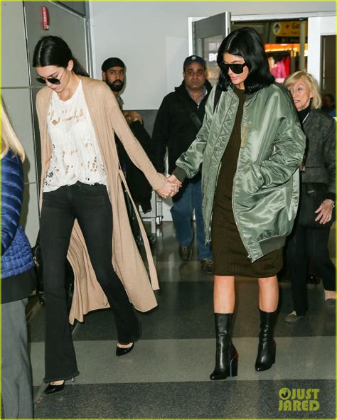 Kendall And Kylie Jenner Hold Hands While Landing In New York City Photo 881462 Photo Gallery
