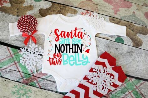 santa ain t got nothin on this belly christmas etsy christmas onesie my first christmas
