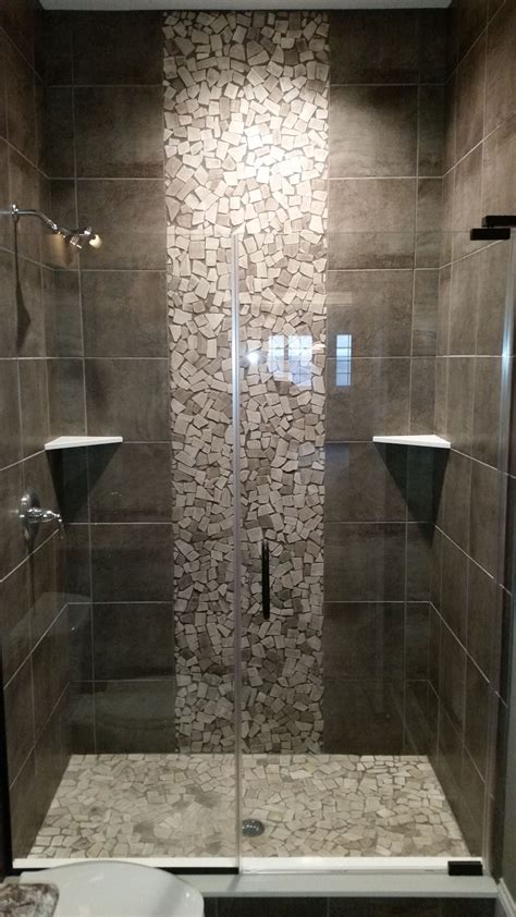 Grey Shower With Pebble Tile Accents As Seen In Our 20000 Sq Ft