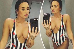 Demi Lovato Risks NIP SLIP As She Squeezes Best Assets Into Plunging Pink Swimsuit Celebrity