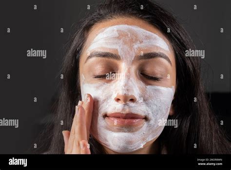 Closed Up Eyes Applying Clay Mask Caucasian Girl Making Spa At Home