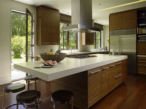 Refacing available in miami dade. Cherry colored Bamboo kitchen cabinets with white counter tops, stainless appliances and ...