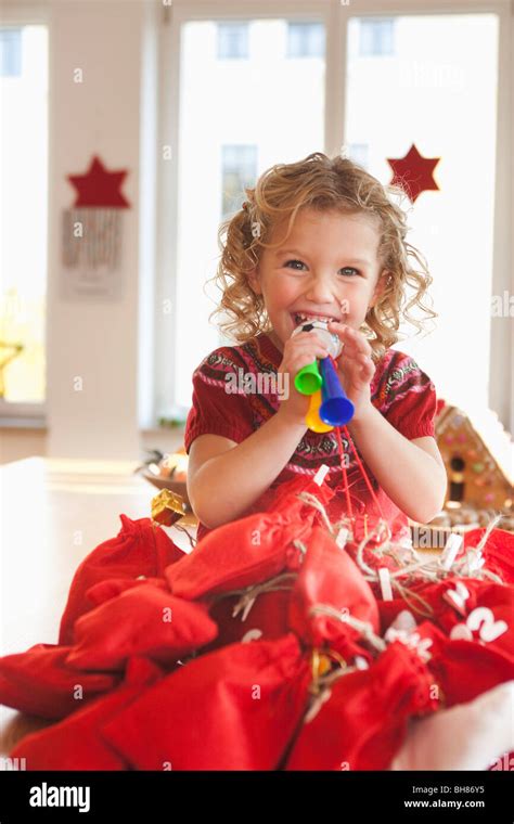 Young Girl Playing With Toy Ts Stock Photo Alamy