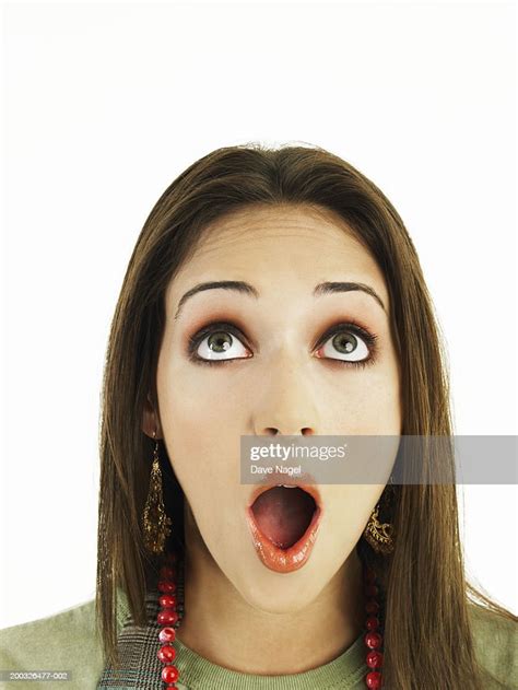 Young Woman With Mouth Open Looking Upward Closeup Photo Getty Images