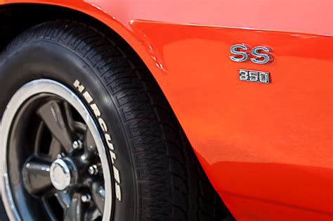 1970 Chevrolet Camaro Ss 350 Wheel Emblem Photograph By Jill Reger