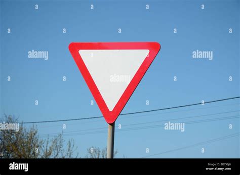 Traffic Sign In The Form Of A White Triangle Give Way Symbol Stock