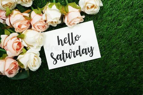 Hello Saturday Text On Black Letter Board And Bouquet Colorful Flowers