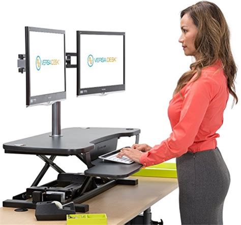 Enjoy a wide range of height, swivel and height adjustment options and make your workspace more efficient freeing up valuable real estate to spread out in and keep stuff, like pictures of friends and family and your coffee cup. VersaDesk Power Pro Desk Converter Review | Sit/Stand Desk ...