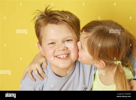 Boy Girl Siblings Kiss Cheek Portrait Stock Photo Alamy