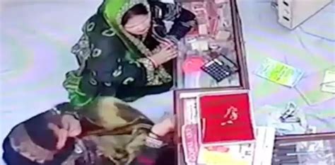 Viral Video Woman Puts Jewellery Into Her Mouth In Bizarre Gold Heist