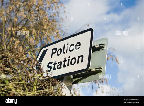 Police Station Sign In Hedge At Kington Herefordshire England Uk Stock