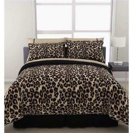 This comforter set features a. Formula Brushstroke Cheetah Reversible Bed in a Bag ...