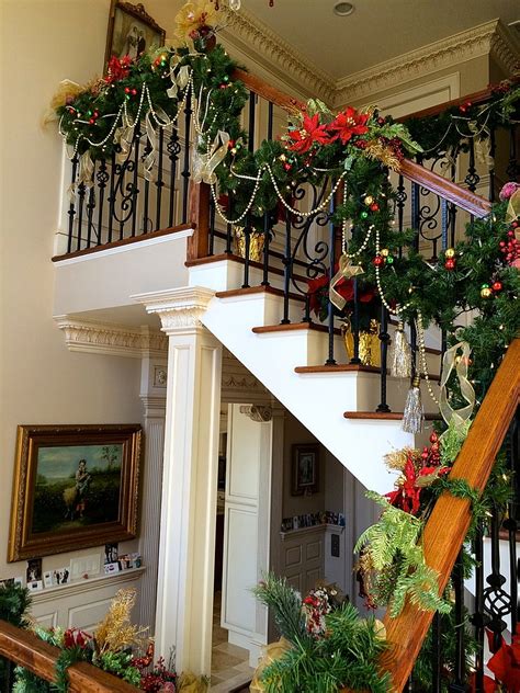 Looking for a festive way to decorate your staircase this christmas? 23 Gorgeous Staircase Christmas Decorating Ideas