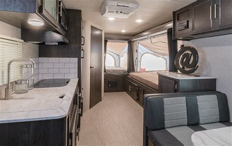 With a 26.6 feet size, this travel trailer allows you to sleep your little ones on the sofa or. Family-Friendly RV: Kodiak Cub 179E Hybrid | Trailer Life