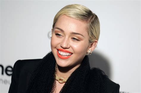 Miley Cyrus Poses Nude With Pig For Paper UPI Com