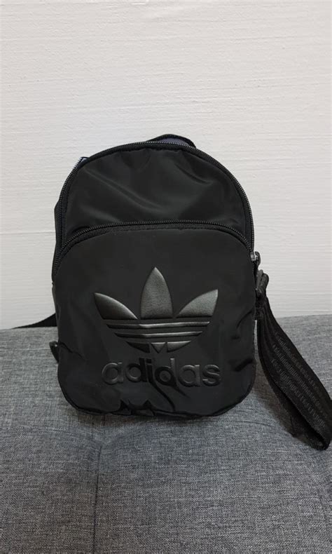 Adidas sling bag price in malaysia april 2021. Adidas originals all black mini backpack/sling bag, Women ...