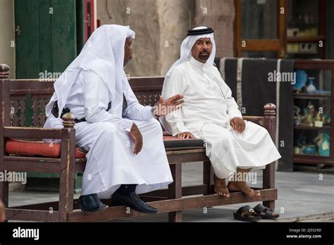Dohaqatar April 152022 Qatari Locals In Traditional Attire Hang