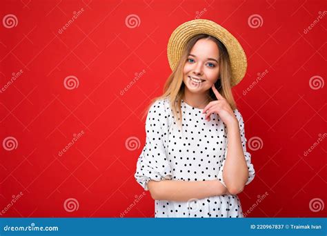 Portrait Of Young Beautiful Smiling Hipster Blonde Woman In Trendy