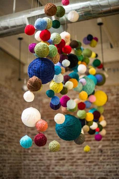 Yarn Balls Hanging From Ceiling Could Do Above Table In Lieu Of A