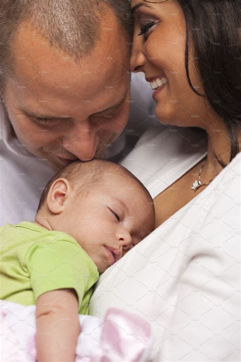 Mixed Race Couple With Newborn Baby ~ People Photos