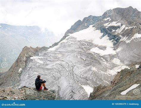 Man Watching Glacier Melting In Italian Alps Stock Image Image Of Italian Mountain