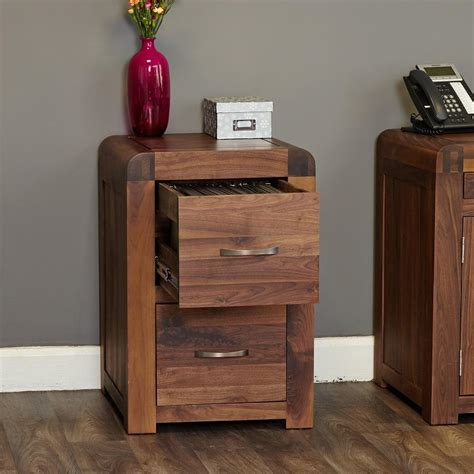 Wall of filing cabinets and open drawers composing a stair 3d illustration. Sophisticated Walnut Small Filing Cabinet