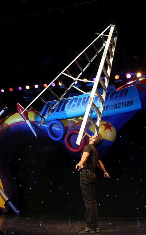Incredible Ladder Balancing Performance In Vegas Ladder Art Wooden Ladder The Incredibles