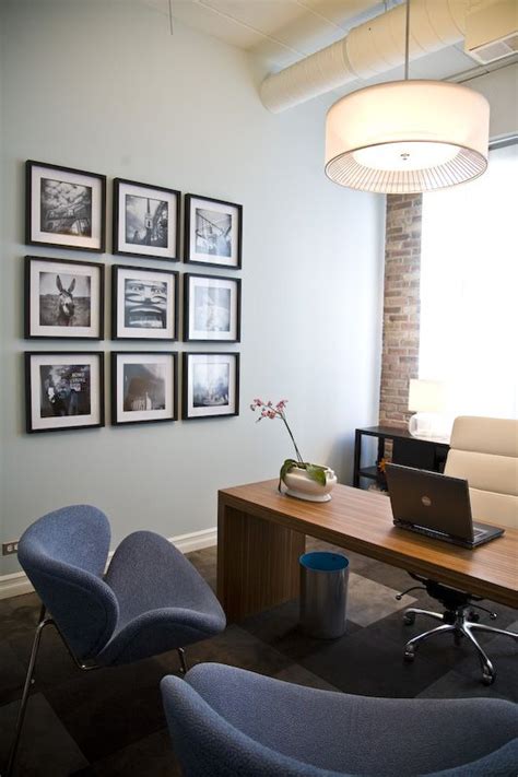 Executive office wall decor | Hawk Haven The combination of modern electronics with the aged wall art and furnishings is a winner in every book.