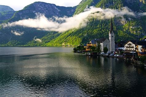 1369051 4k Austria Hallstatt Lake Mountains Houses Clouds Alps