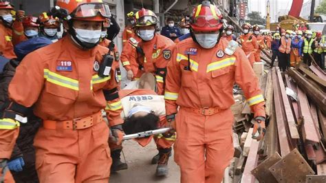 Woman Rescued From Debris 50 Hours After Building Collapse In China