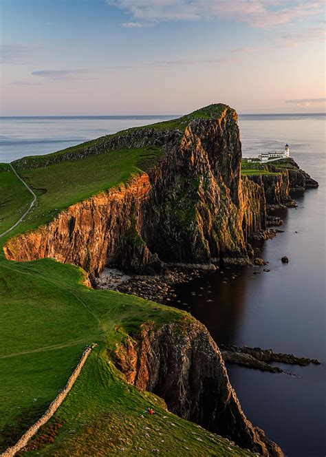 On the cliff edge with a view of neist point lighthouse, isle of skye, scotland. Neist point lighthouse in Isle of Skye, Scotland ...