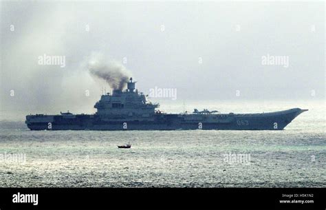 The Russian Aircraft Carrier Admiral Kuznetsov Passes Through The