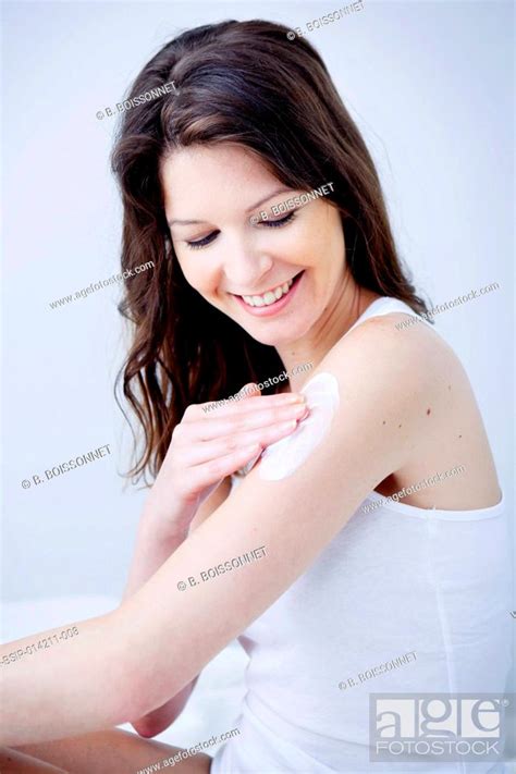 Woman Applying Body Lotion Stock Photo Picture And Rights Managed Image Pic Bsi Bsip