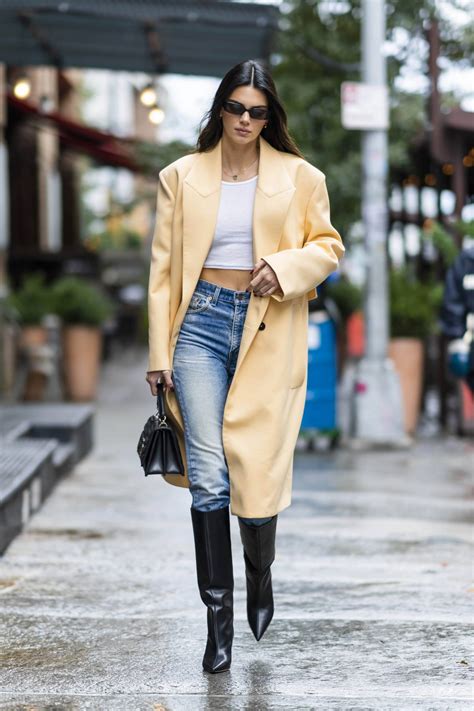 Kendall Jenner Looks Stunning In A Yellow Trench Coat With White Crop