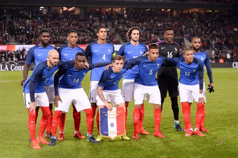 The team's colours are blue, white, and red,. Archives des Equipe de france de football - Arts et Voyages