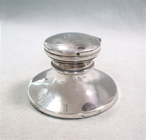 A 20th Century Silver Capstan Inkwell With Hinged Cover And Glass