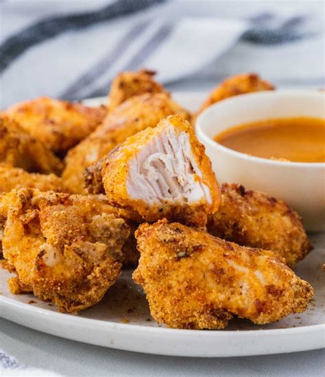 There are 482 calories in a chicken nuggets (10pc) from burger king. Healthy Chicken Nuggets Recipe (Paleo, GF) - Shuangy's KitchenSink