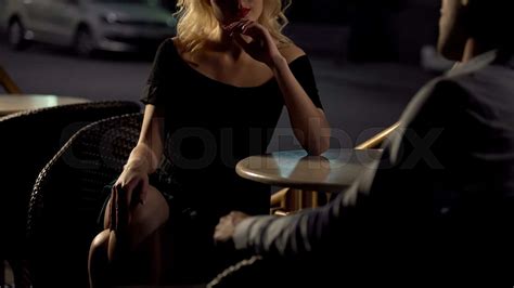 Evening Date Beautiful Female Sitting In Cafe And Seducing Man Passion Stock Image Colourbox