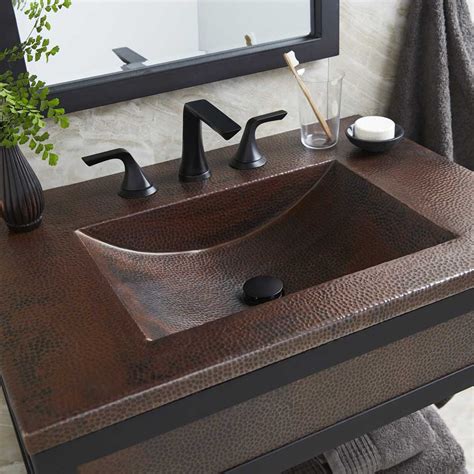 Industrial styling is an unexpected accompaniment to this simple white double sink bathroom vanity with top in contrasting wood. Cozumel Vanity Top | Native Trails