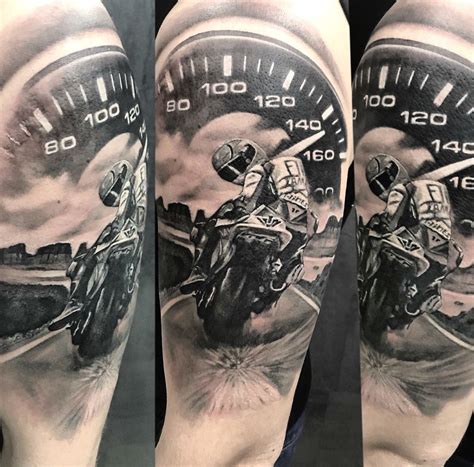 A Mans Arm With A Speedometer And Motorcyclist On It