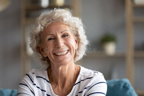 Head Shot Close Up Portrait Of Happy Grey Haired Old Woman Stock Photo