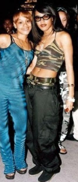 Aaliyah In Camouflage With Lefteye Of Tlc Hip Hop Fashion S Fashion Fashion Outfits