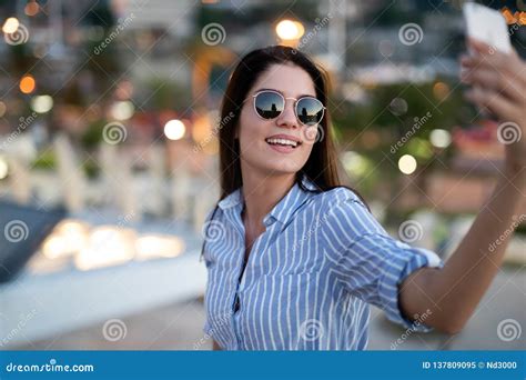 Beautiful Happy Woman Taking Selfie Outdoor At Night Stock Image
