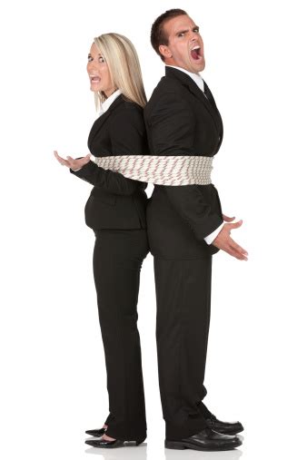 Business Couple Tied Up With A Rope And Shouting Stock Photo Download