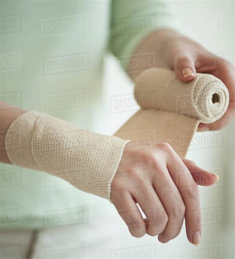 Wrapping Hand In Tensor Bandage Stock Photo Dissolve
