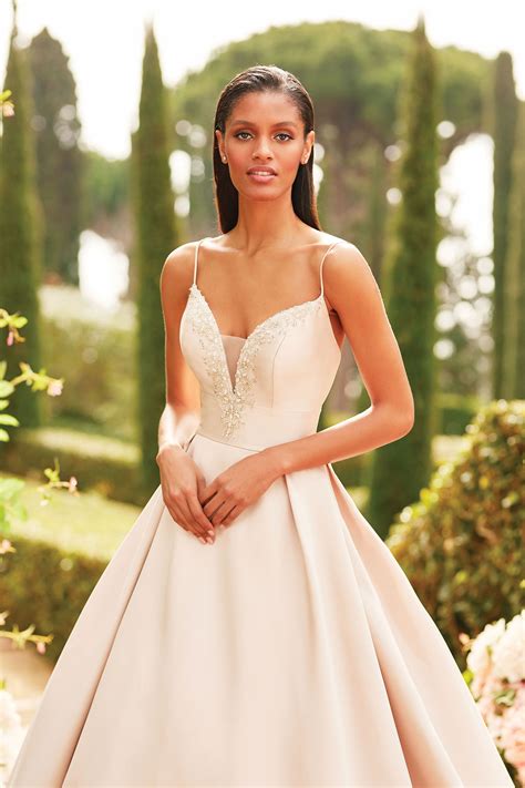 Maybe you would like to learn more about one of these? Style 44186: Mikado Ball Gown with Beaded Plunging ...